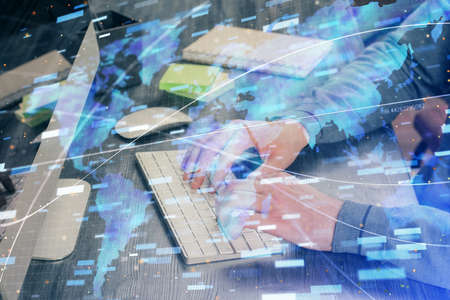 Double exposure of technology hologram with man working on computer background. Concept of big data.
