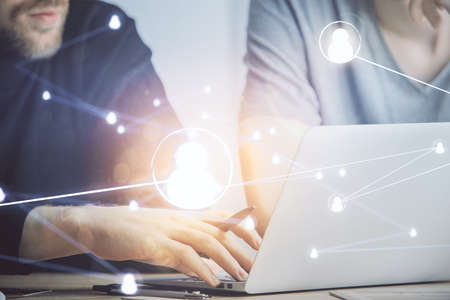 Media network theme hologram with man working on computer on background. Concept of internet...