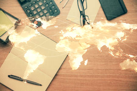 Multi exposure of business theme drawing and work table top veiw. Concept of international finance.の写真素材