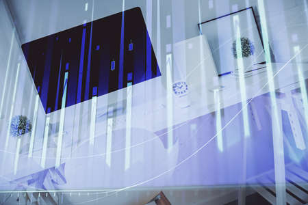 Double exposure of financial graph drawing and office interior background. Concept of stock market.