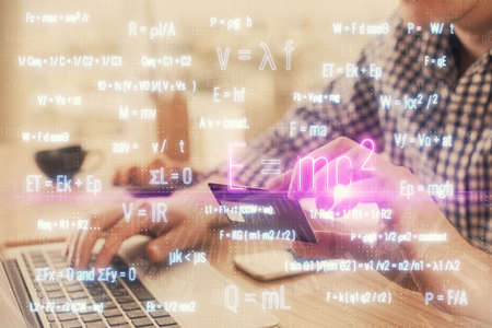 Double exposure of man hands holding a credit card and formula drawing. Education and E-commerce...