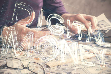 Double exposure of mans hands holding and using a phone and crypto currency blockchain theme...