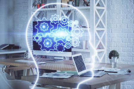 Double exposure of work table with computer and brain sketch hologram. Brainstorming concept.
