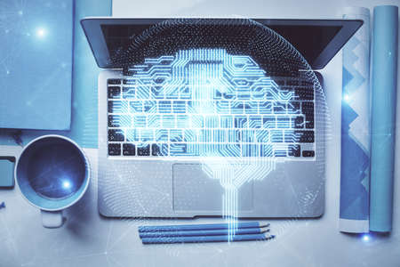 Multi exposure of brain sketch hologram over topview work table background with computer. Concept of...
