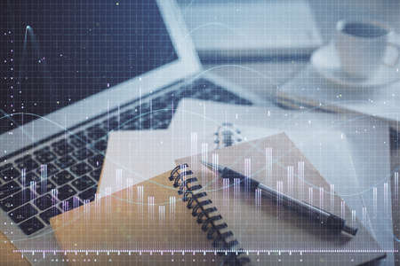 Double exposure of financial chart drawing and desktop with coffee and items on table background....