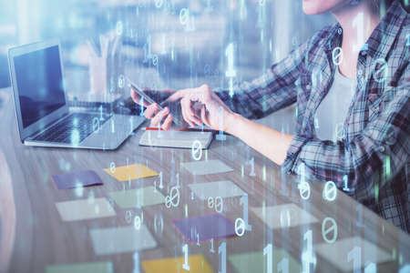 Multi exposure of woman hands working on computer and data theme hologram drawing. Tech concept.