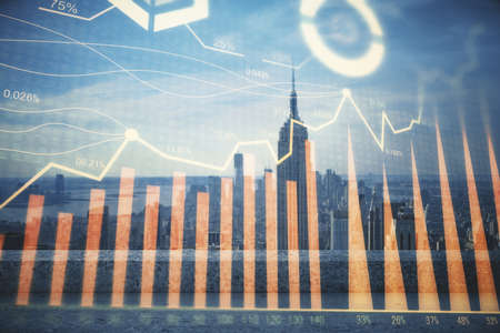 Forex graph on city view with skyscrapers background multi exposure. Financial analysis concept.の写真素材