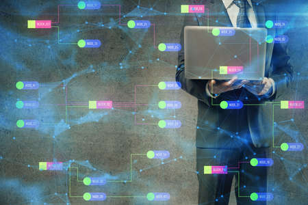 Double exposure of data internet theme hologram with man working on computer on background. Concept...