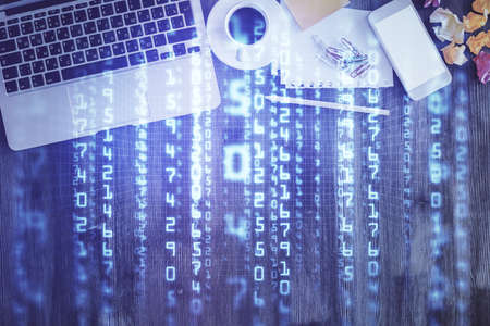 Multi exposure of data theme drawing hologram over topview work desk background with computer. Concept of technology.の写真素材