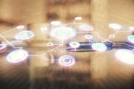 Double exposure of social network theme drawing hologram over coffee cup background in office....