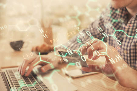 Double exposure of man hands holding a credit card and formula drawing. Education and E-commerce...