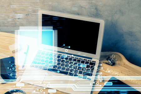 Double exposure of desktop computer and technology theme hologram. Concept of software development.