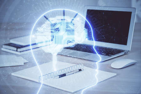 Multi exposure of work table with computer and brain hologram. Brainstorm concept.