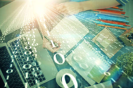 Double exposure of hands making notes with digital coding icons. Computer learning concept.