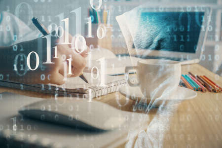 Double exposure of hands making notes with digital coding icons. Computer learning concept.