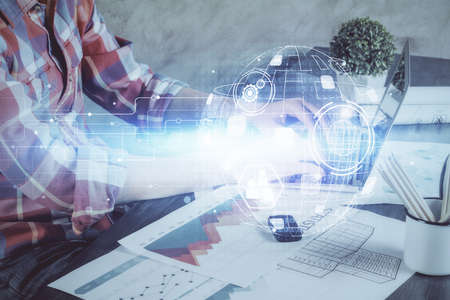 Media network theme hologram with man working on computer on background. Concept of internet...
