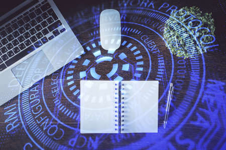 Double exposure of data theme drawing hologram over topview work table background with computer. Concept of technology.の写真素材