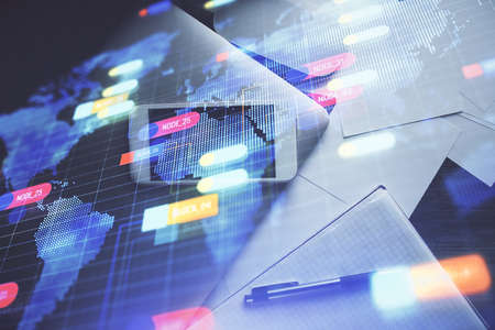 Double exposure of technology theme drawing over work table desktop. Top view. Global data analysis concept.の写真素材