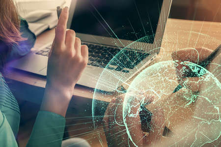 Double exposure of man and woman working together and social network theme hologram drawing. People...
