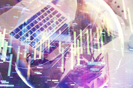 Multi exposure of woman hands typing on computer and business theme hologram drawing. Success...