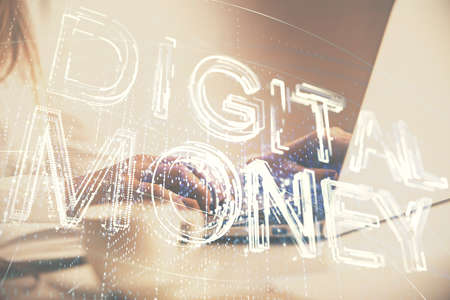 Double exposure of woman hands typing on computer and crypto market theme hologram drawing. Blockchain concept.の写真素材