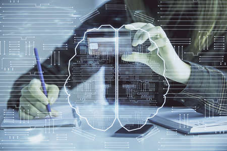 Double exposure of woman on-line shopping holding a credit card and brain hologram drawing. Data...