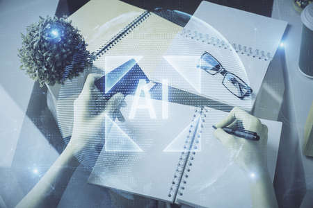 Double exposure of woman on-line shopping holding a credit card and data theme hologram drawing. E-commerce concept.の写真素材