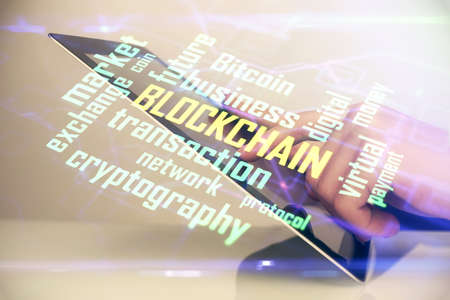 Double exposure of mans hands holding and using a phone and crypto currency blockchain theme drawing.の写真素材