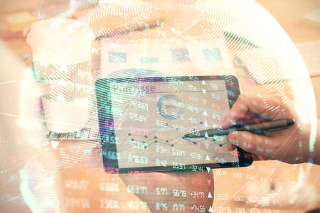 Double exposure of mans hands holding and using a phone and international business theme drawing.
