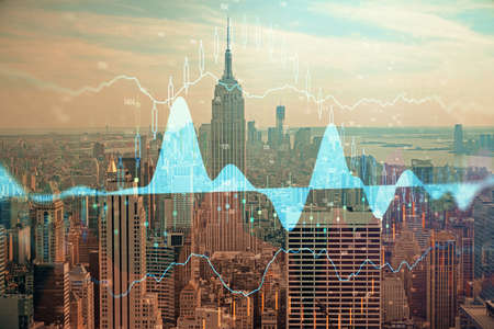 Forex graph on city view with skyscrapers background double exposure. Financial analysis concept.