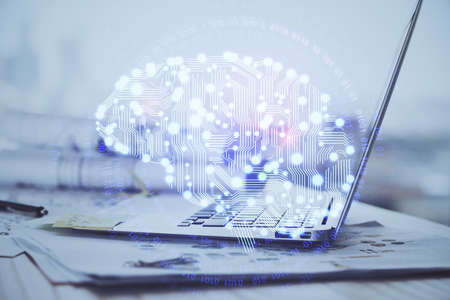 Multi exposure of work table with computer and brain hologram. Brainstorm concept.