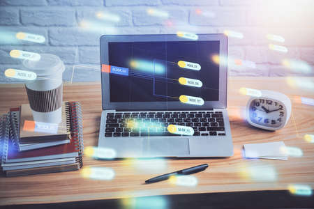 Technology theme drawing and table with computer. Double exposure. Concept of information.の写真素材