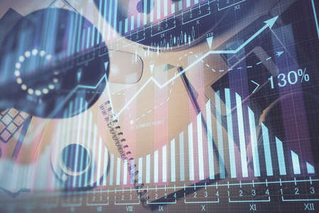 Multi exposure of forex chart drawing and work table top veiw. Concept of financial analysis.