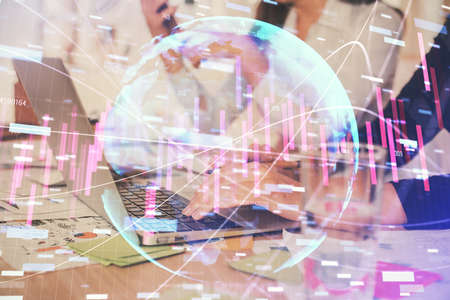 Multi exposure of woman hands typing on computer and forex chart hologram drawing. Stock market analysis concept.の写真素材