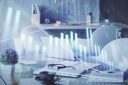 Double exposure of stock market graph drawing and office interior background. Concept of financial...