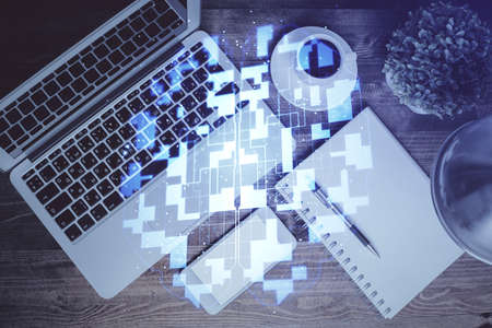 Multi exposure of data theme drawing hologram over topview work desk background with computer. Concept of technology.の写真素材