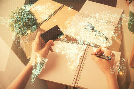 Multi exposure of woman on-line shopping holding a credit card and social network theme drawing....