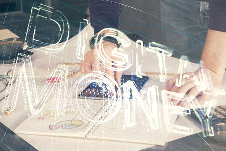 Double exposure of mans hands holding and using a phone and crypto currency blockchain theme drawing.の写真素材
