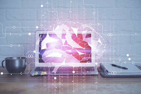 Multi exposure of work table with computer and brain hologram. Brainstorm concept.