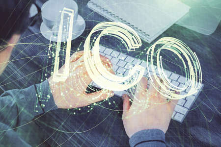 Blockchain theme hud with businessman working on computer on background. Concept of crypto chain....