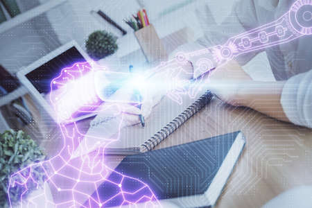 AR hologram over womans hands taking notes background. Concept of augmented reality. Multi exposure