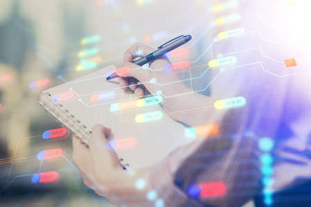 Multi exposure of womans writing hand on background with data technology hud. Concept of innovation.