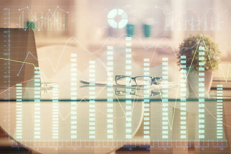 Double exposure of financial graph drawing and office interior background. Concept of stock market.の写真素材
