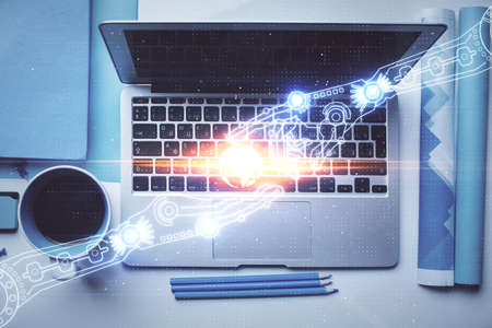 Multi exposure of data theme drawing hologram over topview work desk background with computer. Concept of technology.の写真素材