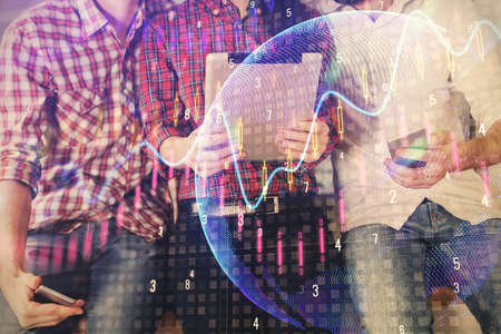 Double exposure of forex graph drawing and man and woman working together holding and using a mobile...