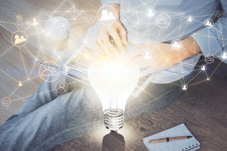 Media network theme hologram with man working on computer on background. Concept of internet...
