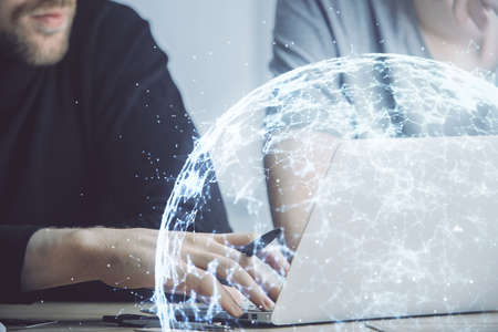 Media network theme hologram with man working on computer on background. Concept of internet...