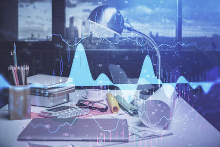 Double exposure of stock market graph drawing and office interior background. Concept of financial...