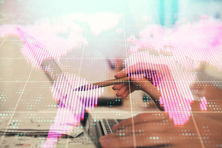Multi exposure of woman hands typing on computer and business theme hologram drawing. Success...