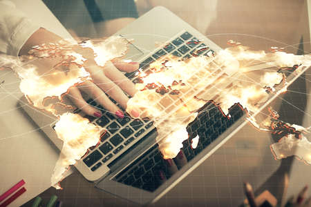 Multi exposure of woman hands typing on computer and business theme hologram drawing. Success...